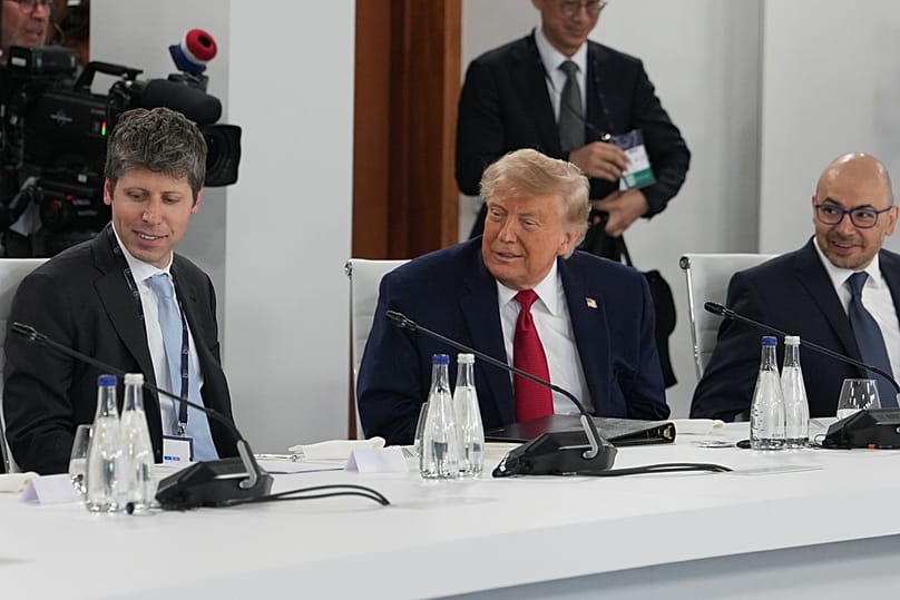 US President Donald Trump sits with OpenAI's Sam Altman and Google's Demis Hassabis as they participate in a G7 summit meeting, June 17, 2026, in Evian-les-Bains, FranceUS Pre