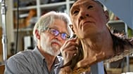 Paleoartist John Gurche adds hair to the reconstruction of Neanderthal Shanidar 1 in his studio in Trumansburg, New York, on 31 May 2023.