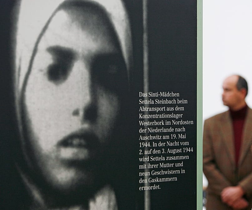 Photograph of Settela Steinbach at the exhibition ‘The Nazi Genocide of the Sinti and Roma’ – January 2008, Weimar, Germany (AP Photo / Jens Meyer)