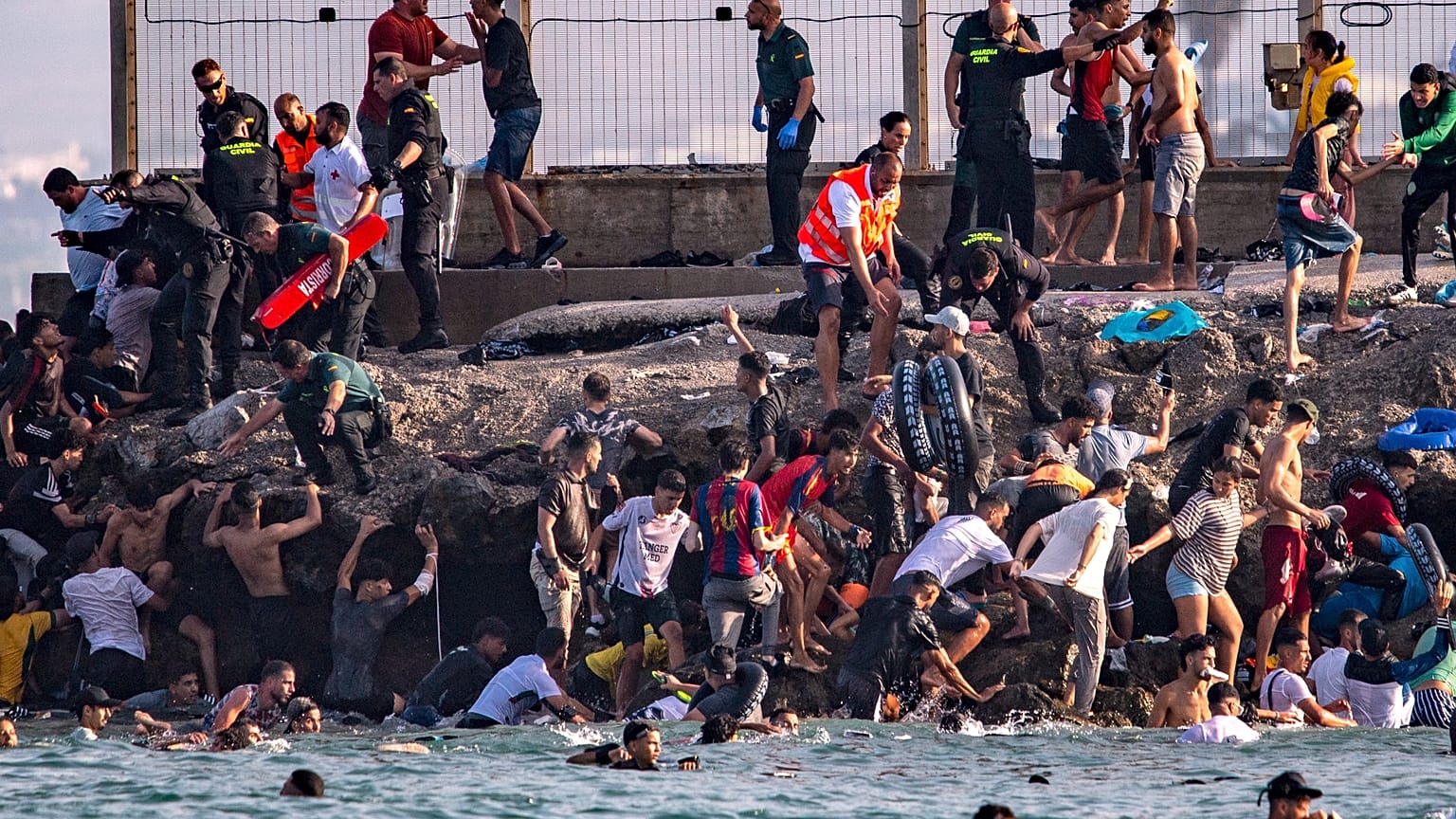 Around 60,000 migrants have crossed into Spain's Ceuta from Morocco in a single day