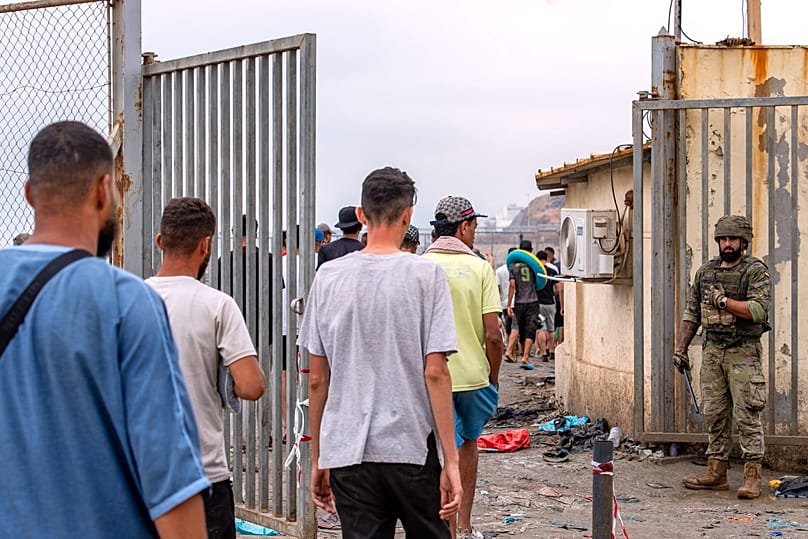 Migrants return to Morocco from the Spanish enclave of Ceuta, Friday, July 31, 2026. 