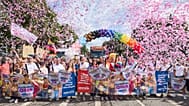 Participants stand on Luebecker Strasse at the start of the Hamburg Pride 2026 parade for Christopher Street Day (CSD), in Hamburg, Germany, Saturday Aug. 1, 2026. 