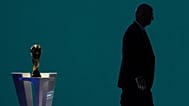 FIFA President Gianni Infantino is silhouetted as he walks past the World Cup trophy after addressing the 76th FIFA Congress in Vancouver, British Columbia, April 30, 2026.