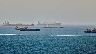 Tankers and cargo vessels are seen in the Gulf of Oman along shipping routes linking the Strait of Hormuz and the Arabian Sea on 16 June 2026.