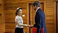 Myanmar's ousted leader Aung San Suu Kyi shakes hands with Arnaud de Baecque from the Red Cross in Naypyidaw, 3 August, 2026