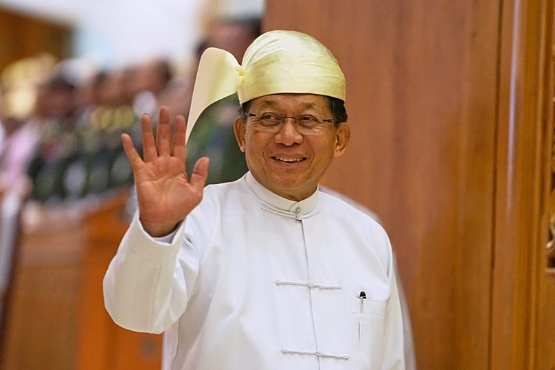 Myanmar’s President Min Aung Hlaing waves as he leaves after delivering speech at the Union Parliament in Naypyidaw, 31 July, 2026