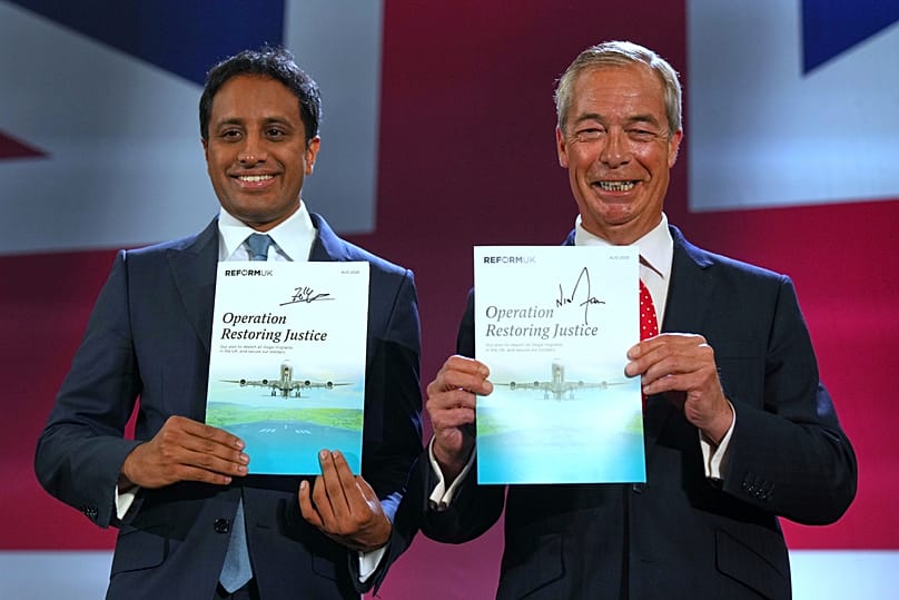 Reform UK party leader Nigel Farage and Zia Yusuf during a press conference in Kidlington, 26 August, 2025
