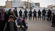 مسلحون فلسطينيون من حماس والجهاد الإسلامي يتجمعون خلال صلاة عيد الفطر في مدينة غزة، الجمعة 20 مارس 2026. 