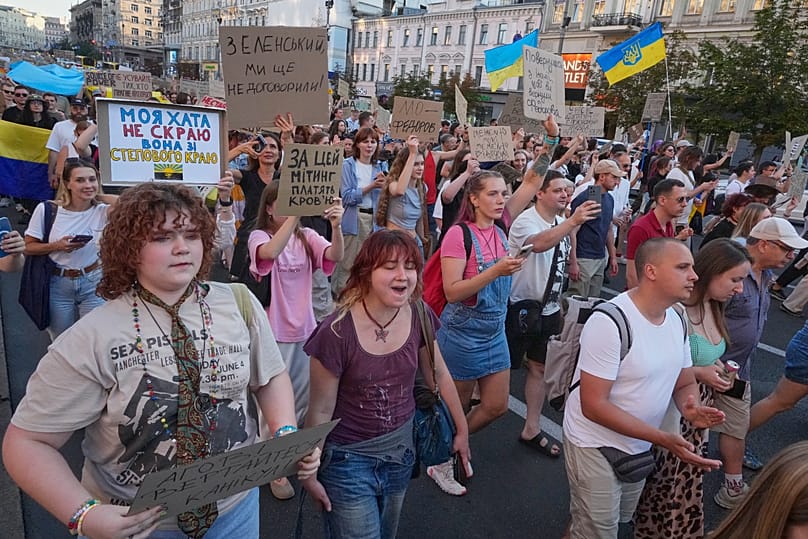 Activists shout slogans during a thousands-strong rally to denounce Volodymyr Zelenskyy's decision to dismiss Defense Minister Mykhailo Fedorov, Kyiv, Ukraine July 31, 2026.