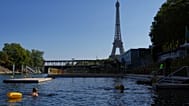 People swim in the Seine river, Monday, Aug. 11, 2025 in Paris. 