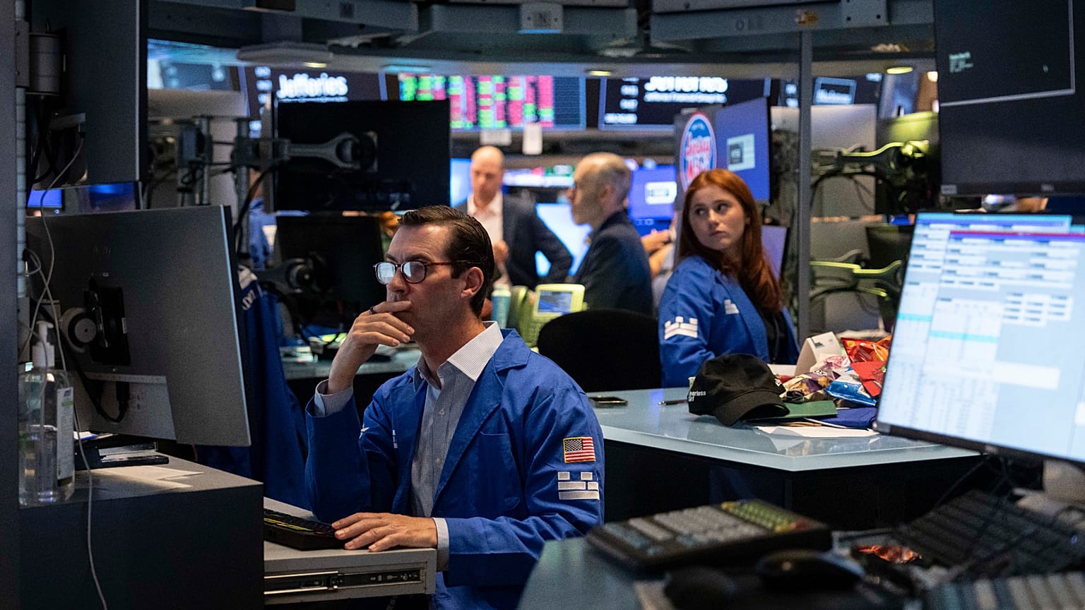FILE - Specialist John Mcnierney works on the floor of the New York Stock Exchange, Thursday, July 30, 2026, in New York