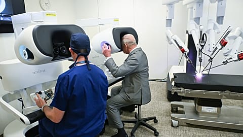 FILE - Britain's King Charles III, right, visits the King's College London Innovation Hub at Guy's Hospital Cancer Centre in London, May 11, 2026.