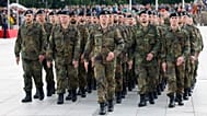 German soldiers march at a formal inauguration of a German brigade for NATO's eastern flank in Vilnius, 22 May, 2025