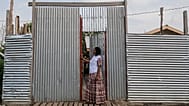 Esther Lutula, 26, four months pregnant and a mother of four, stands outside her home in Bunia, northeastern DR Congo, on 16 June 2026, during the Ebola outbreak.