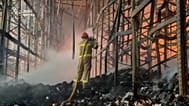 Russian missile and drone strikes kill at least 15 people in Kyiv and the surrounding region as emergency crews battle fires overnight.
