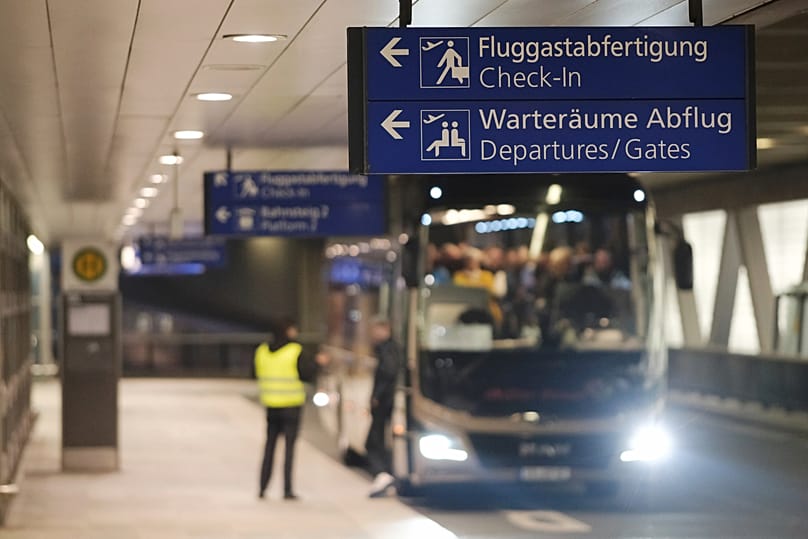 A coach for passengers stands at Leipzig-Halle Airport in Schkeuditz, 10 March, 2025