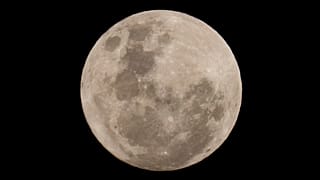 A blue moon rises in San Jose de Maipo outskirts of capital Santiago, Chile, May 30, 2026. (AP Photo/Esteban Felix, File)
