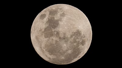 A blue moon rises in San Jose de Maipo outskirts of capital Santiago, Chile, May 30, 2026. (AP Photo/Esteban Felix, File)