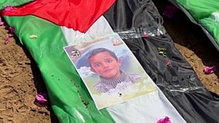 Funeral held in Gaza after crews recover 112 bodies from the site of a deadly 2023 air strike, with many victims still missing beneath rubble.