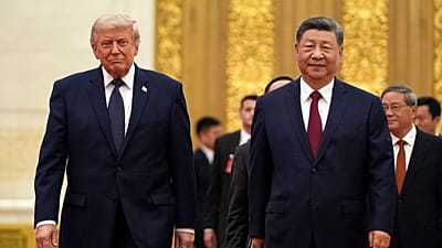 FILE - President Donald Trump, left, and Chinese President Xi Jinping arrive during a state dinner at the Great Hall of the People, May 14, 2026, in Beijing. 