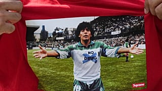 A fan wears a shirt depicting Argentinian player Diego Maradona during the World Cup final soccer match between Argentina and Spain, Sunday, July 19, 2026