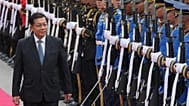 Myanmar's President Min Aung Hlaing reviews an honour guard during a welcome ceremony at the Government House in Bangkok, 6 August, 2026