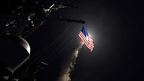 The guided-missile destroyer USS Porter launches a tomahawk land attack missile in the Mediterranean Sea, 7 April, 2017