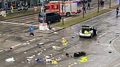 Emergency services attend the scene of an accident after a driver hit a group of people in Munich, 13 February, 2025
