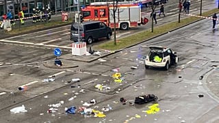 Emergency services attend the scene of an accident after a driver hit a group of people in Munich, 13 February, 2025