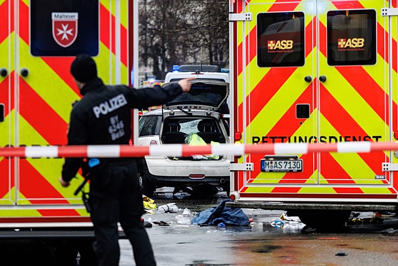 Emergency services attend the scene of an accident after a driver hit a group of people in Munich, 13 February, 2025