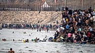 Migrants return to Morocco from the Spanish enclave of Ceuta, Friday, July 31, 2026.