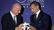  UEFA President Aleksander Ceferin, right, and FIFA President Gianni Infantino pose during the 48th UEFA congress in Paris, Thursday, Feb. 8, 2024.