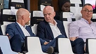 FIFA president Gianni Infantino, center, speaks to FIFA secretary general Mattias Grafstrom, left, sitting beside president of Moroccan Royal Football Federation Fouzi Lekjaa.