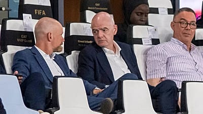 FIFA president Gianni Infantino, center, speaks to FIFA secretary general Mattias Grafstrom, left, sitting beside president of Moroccan Royal Football Federation Fouzi Lekjaa.