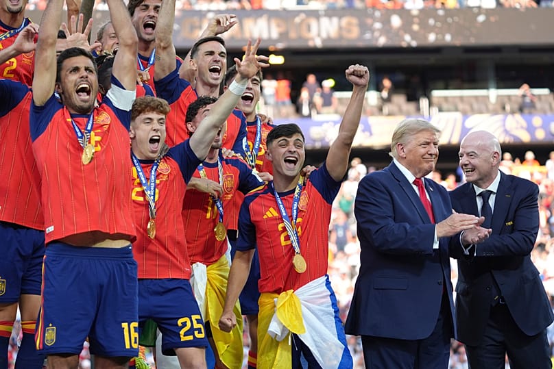 Spain players, from left, cheer alongside President Donald Trump and FIFA President Gianni Infantino at the conclusion of the World Cup.