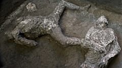 The casts of what are believed to have been a rich man and his male slave fleeing the volcanic eruption of Vesuvius nearly 2,000 years ago