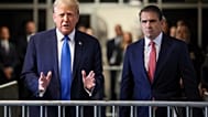 President Donald Trump speaks to reporters on concealed hush money payments case, next to his attorney Todd Blanche, at Manhattan state court in New York, 22 April 2024.