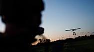 A serviceman with Ukraine’s K-2 brigade launches a midrange drone toward Russian positions on the front line in Ukraine’s Donetsk region on 22 June 2026.