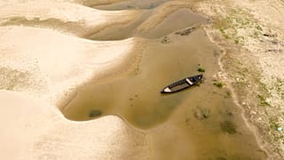 Usually submerged areas of the Danube River are exposed amid exceptionally low water levels, in Rasova, Romania, Monday, 4 August 2026.