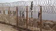 People who attempted crossing to the Spanish enclave of Ceuta return to the Moroccan northern town of Fnideq, Saturday, Aug. 1, 2026.