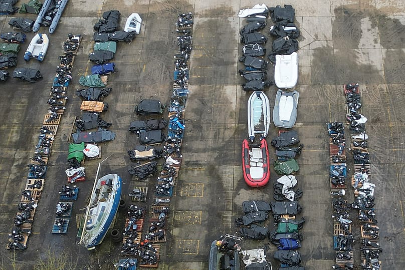 A general view of small boats and inflatable dinghies in a Border Force compound in Dover, 26 February, 2025