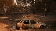 A car burned by a wildfire sits in Piedralaves, 28 July, 2026