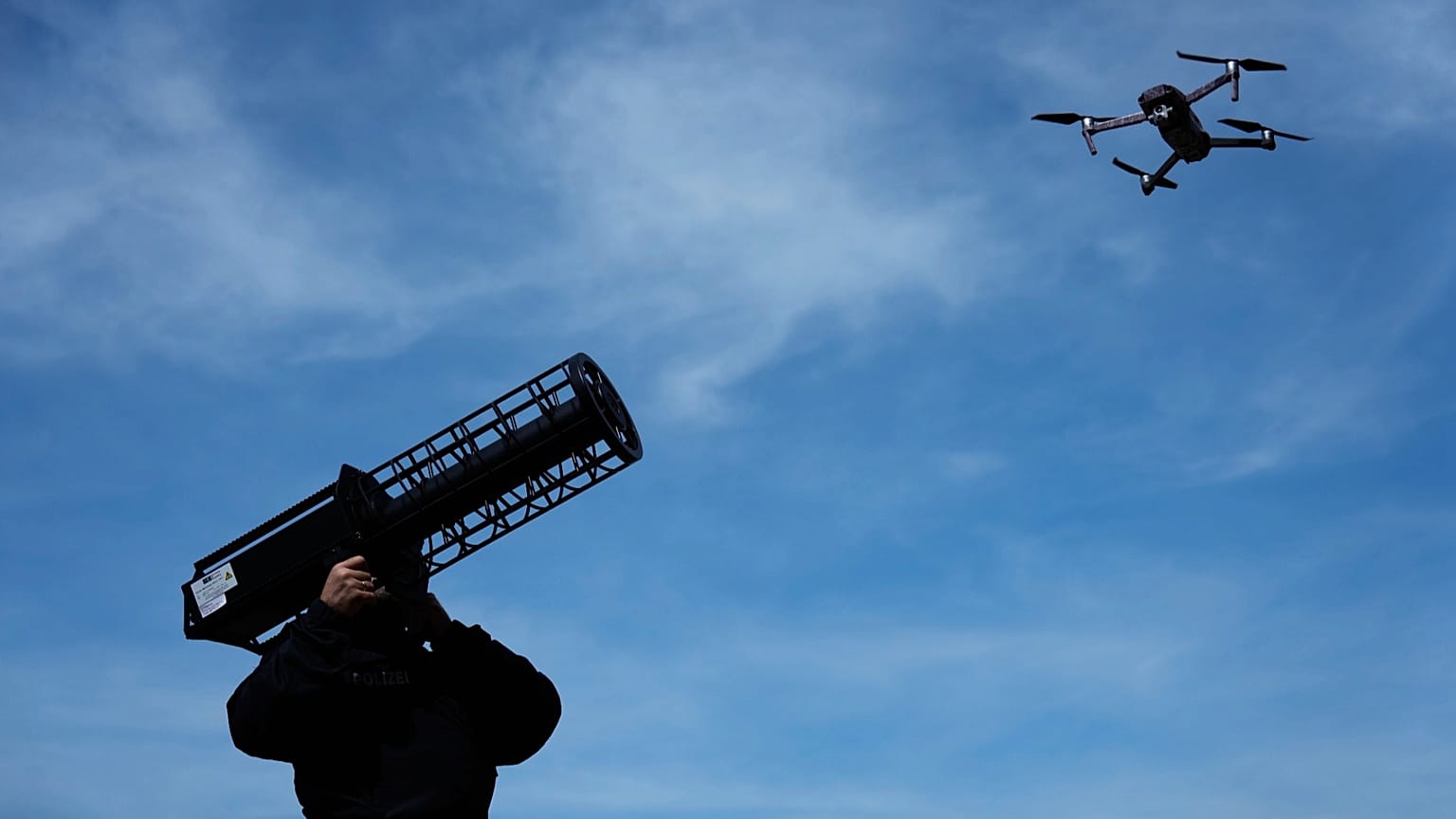 A police officer poses with an anti-drone signal jammer during after the opening ceremony of a Drone Competence and Defence centre in Erding, 4 May, 2026