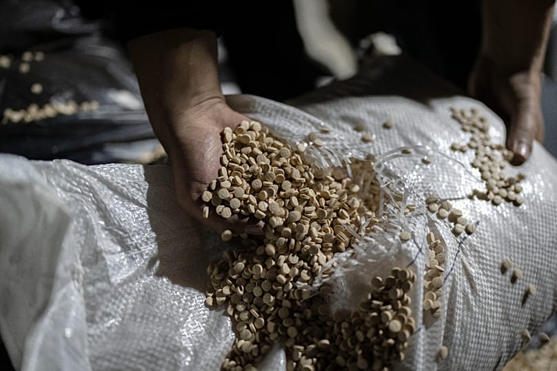 FILE: Syrian forces inspect captagon pills inside a military facility where they were made before the fall of the al-Assad regime on the outskirts of Damascus, 7 January 2025