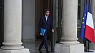 FILE - Former French Prime minister Gabriel Attal leaves after a meeting with French president Emmanuel Macron at the Elysée Palace, in Paris, 10 October 2025
