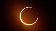 FILE - The moon moves in front of the sun during an annular solar eclipse, or ring of fire, seen from San Antonio, on Saturday, Oct. 14, 2023. 
