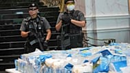 ARCHIVE : Des colis contenant près de 2,4 tonnes de méthamphétamine sous forme de cristaux, dissimulés dans des sacs de farine de maïs, Bangkok, le lundi 23 juin 2025.