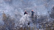 Feuerwehrleute bekämpfen nahe Cotignac in Südfrankreich einen Waldbrand, 22. Juli 2026.