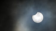 This image provided by NASA and caA partial solar eclipse is seen over Johannesburg, 17 February, ptured by the Artemis II crew shows the Moon eclipsing the Sun, 6 April, 2026