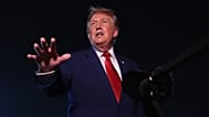 US President Donald Trump talks to reporters after arriving at Joint Base Andrews, 11 August, 2026
